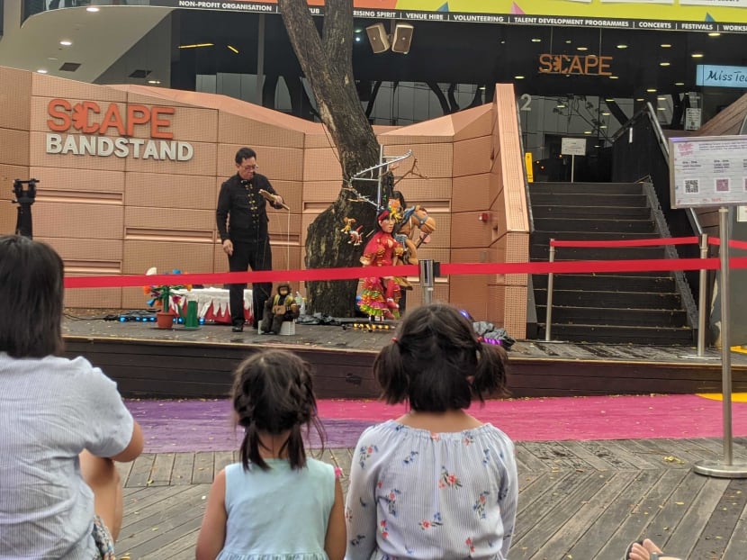 Marionettist Patrick Wan, 64, performing at *Scape mall on Dec 5, 2020.