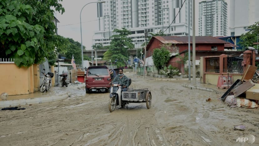 Commentary: Floods, inflation and COVID-19 - Malaysians have had it rough Commentary: Floods, inflation and COVID-19 - Malaysians have had it rough