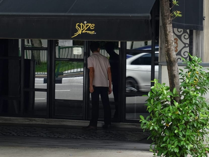 An onlooker looks into the shuttered Spize outlet at River Valley on Friday, December 7, 2018. It will have its licence terminated immediately, after a joint investigation by the NEA, AVA and MOH found several hygiene lapses, including unlicensed food handlers, and poor personal hygiene from food handlers. An onlooker looks into the shuttered Spize outlet at River Valley on Friday, December 7, 2018. It will have its licence terminated immediately, after a joint investigation by the NEA, AVA and MOH found several hygiene lapses, including unlicensed food handlers, and poor personal hygiene from food handlers.