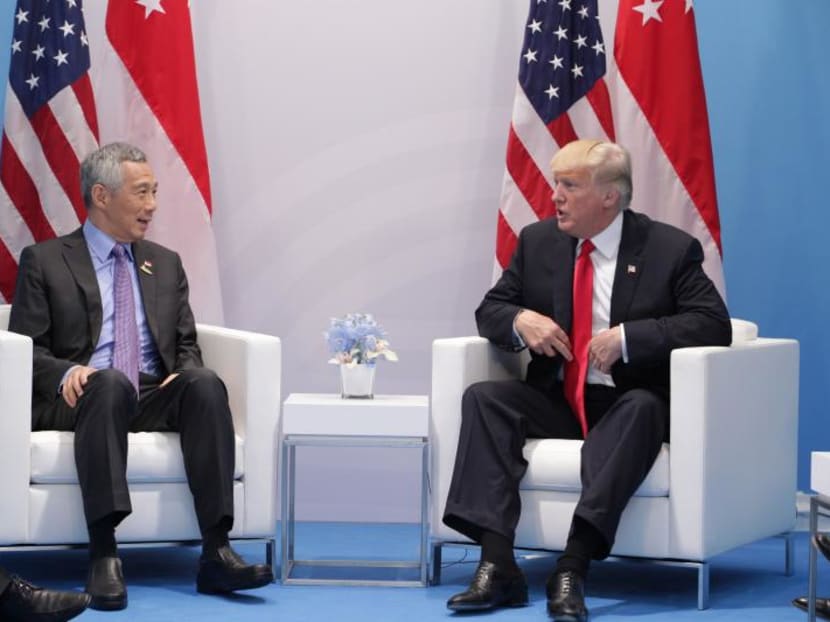 Prime Minister Lee Hsien Loong (left) had offered US President Donald Trump Singapore’s assistance in disaster relief efforts by deploying the Republic of Singapore Air Force’s (RSAF) CH-47 Chinook helicopters from its Peace Prairie detachment in Grand Prairie, Texas. Photo: MCI Prime Minister Lee Hsien Loong (left) had offered US President Donald Trump Singapore’s assistance in disaster relief efforts by deploying the Republic of Singapore Air Force’s (RSAF) CH-47 Chinook helicopters from its Peace Prairie detachment in Grand Prairie, Texas. Photo: MCI