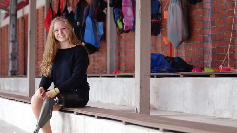 Teen who lost a leg to sarcoma swims 400 laps to raise awareness of the ‘forgotten cancer’