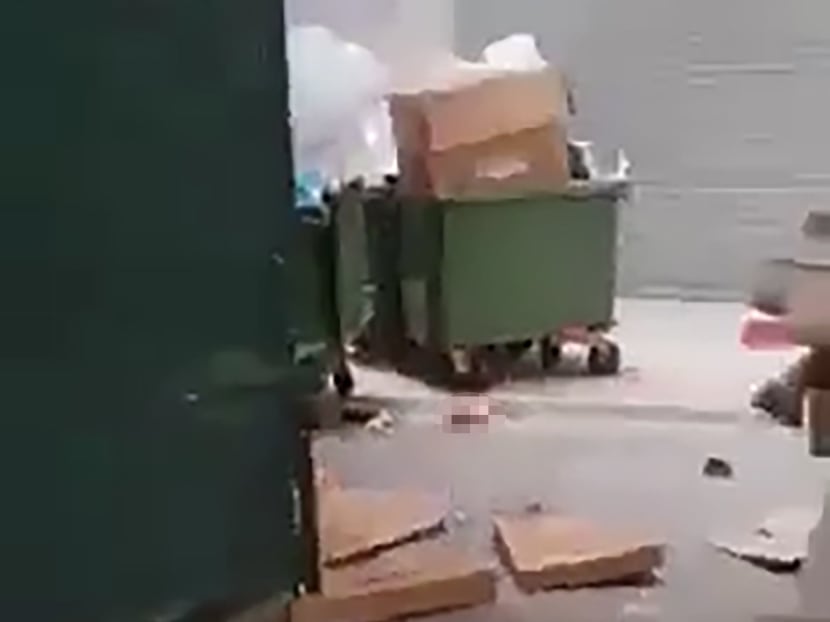 A screen grab of a video circulated on social media, which showed the leg of a 31-year-old man who was pronounced dead at the scene at Block 37 Margaret Drive on March 7, 2022.