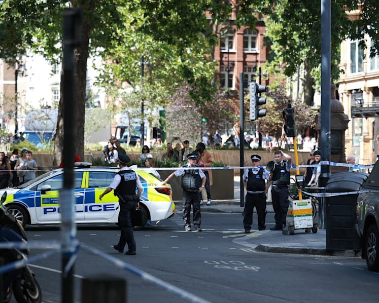 Woman arrested after four men stabbed in central London