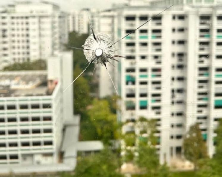 Man arrested after marble fired from catapult allegedly damages Woodlands flat window Man arrested after marble fired from catapult allegedly damages Woodlands flat window