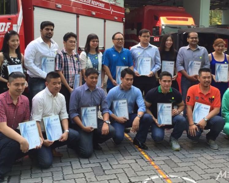 16 honoured for rescuing man pinned under trailer truck