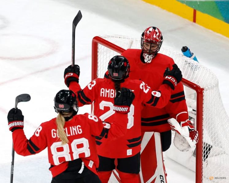 Ice hockey-Poulin powers Canada into women's final with US