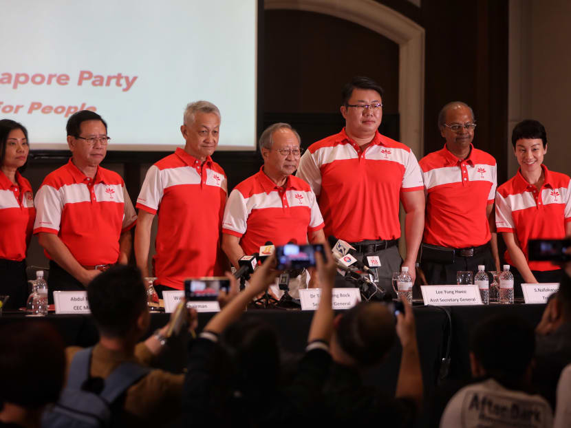 Dr Tan Cheng Bock (centre) and members of the Progress Singapore Party's Central Executive Committee.