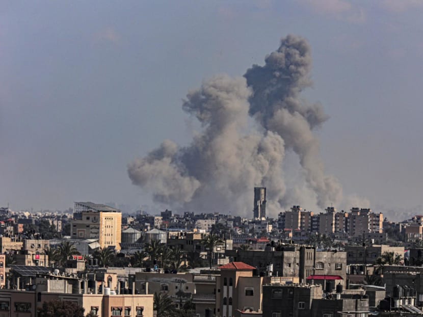 Smoke billowing over Khan Yunis in the southern Gaza Strip during Israeli bombardment on March 11, 2024, amid ongoing battles between Israel and the Palestinian militant group Hamas.