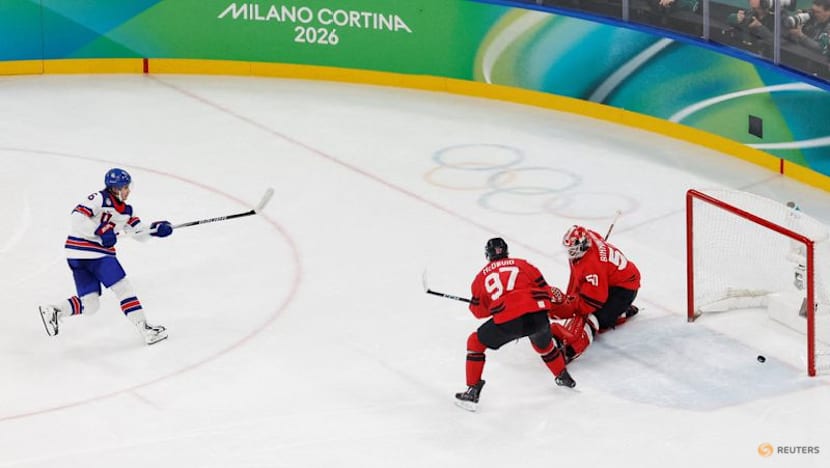 Ice hockey-US claim long-awaited gold by beating rivals Canada in overtime thriller