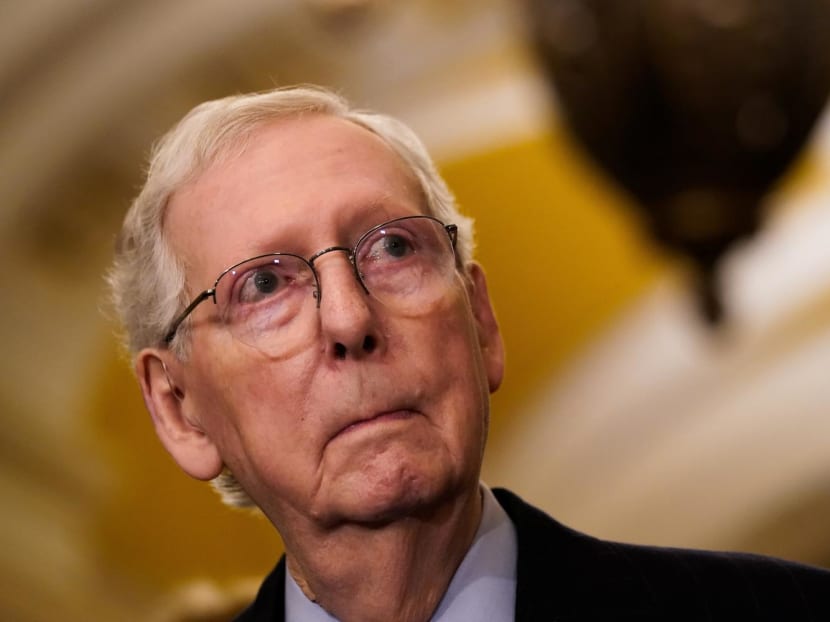 US Senate Minority Leader Mitch McConnell listens to a question from a reporter following a meeting at the White House and the Senate Republicans weekly policy lunch at the US Capitol in Washington, US, February 27, 2024. 