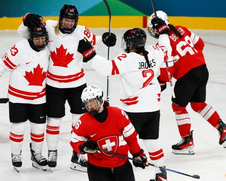 Ice hockey-Canada start title defence with win, Knight ties US record