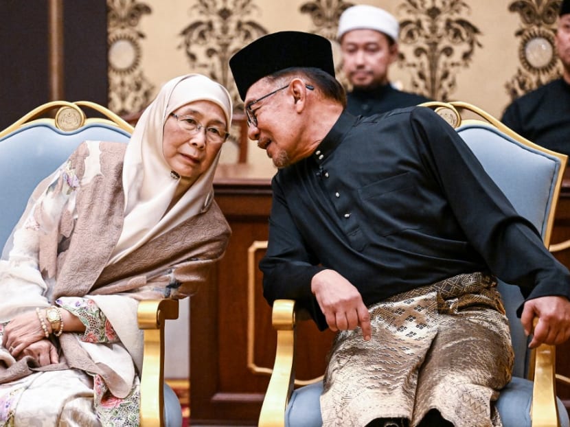 Malaysia's newly appointed Prime Minister Anwar Ibrahim and his wife Wan Azizah Wan Ismail taking part in the swearing-in ceremony at the National Palace in Kuala Lumpur on Nov 24, 2022.
Malaysia's newly appointed Prime Minister Anwar Ibrahim and his wife Wan Azizah Wan Ismail taking part in the swearing-in ceremony at the National Palace in Kuala Lumpur on Nov 24, 2022.