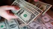 Dollar hits 13-month high as rate-hike bets, stock rout boost demand