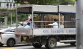 Migrant worker rights group calls for transport subsidy to help firms stop ferrying workers in lorries
