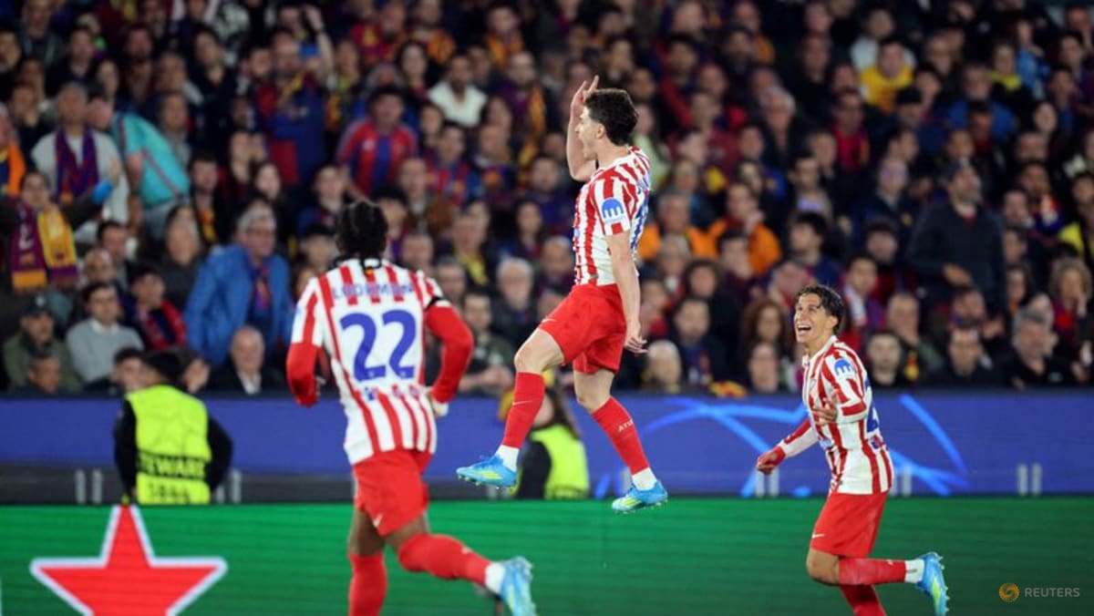 Atletico Madrid storm Camp Nou with 2-0 Champions League win over 10-man Barcelona