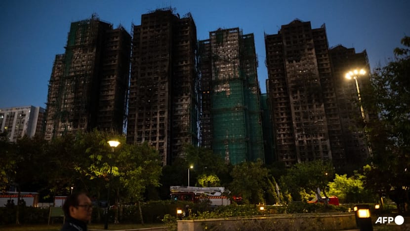 Hong Kong tower fire toll rises to 128, more arrests made