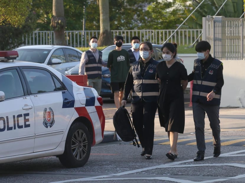 Luxury goods scam: Fugitive couple arrested in Johor Bahru, brought back to Singapore