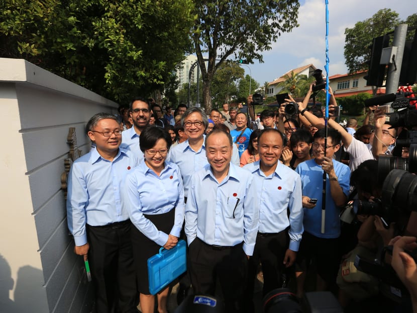 Workers' Party members arrive at the Raffles Institution nomination centre. Photo: Koh Mui Fong