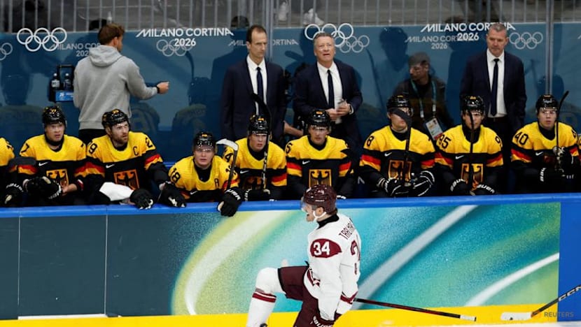 Ice hockey-Slovakia win group, US beat Denmark, Finland, Latvia notch wins