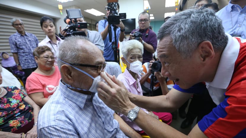 Face masks, supplies given to the vulnerable to cope with haze