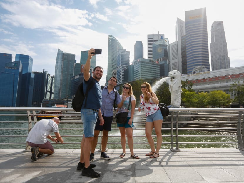 Tourists taking wefies at the Merlion Park on Feb 11, 2020.