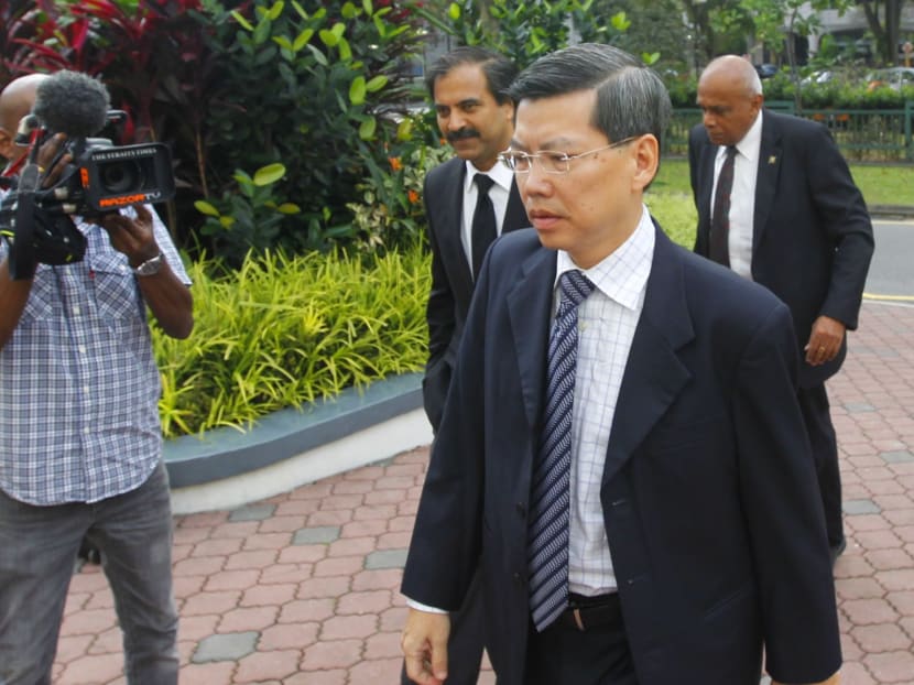 Former SCDF head Peter Lim Sin Pang, the accused in the sex-for-contracts corruption case, arriving at the courts on March 18, 2013. Photo: Ernest Chua