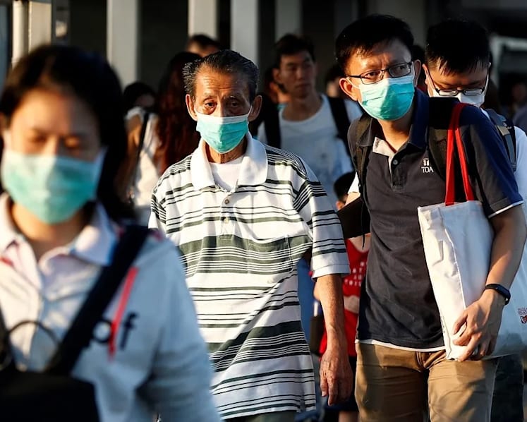 Malaysians in Singapore told to stay put for another two weeks