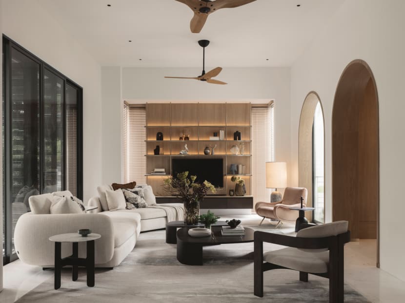 The simple architecture of this house in Singapore belies the warm and inviting space that lies within 