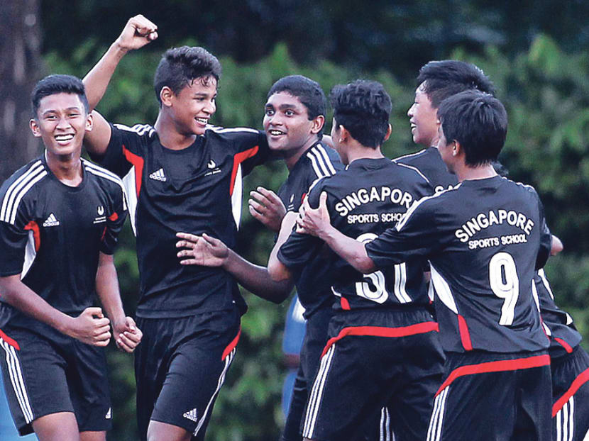 Irfan Fandi (second from left) with his Singapore Sports School team-mates at last year’s National Inter-School Championships finals. The 17-year-old is one year shy of being eligible to play professionally. TODAY File Photo