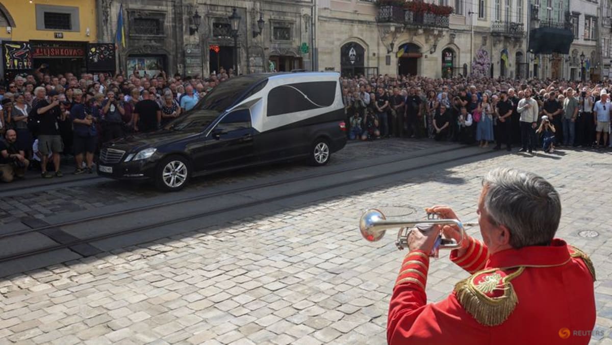 Former Ukraine parliament speaker Parubiy buried after assassination in Lviv