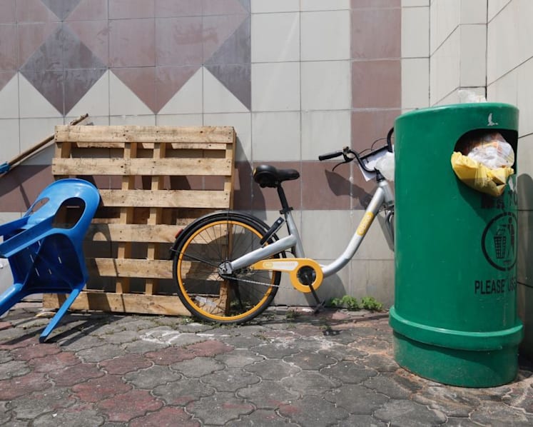 Bike-sharing firms worry about costs of complying with new laws
