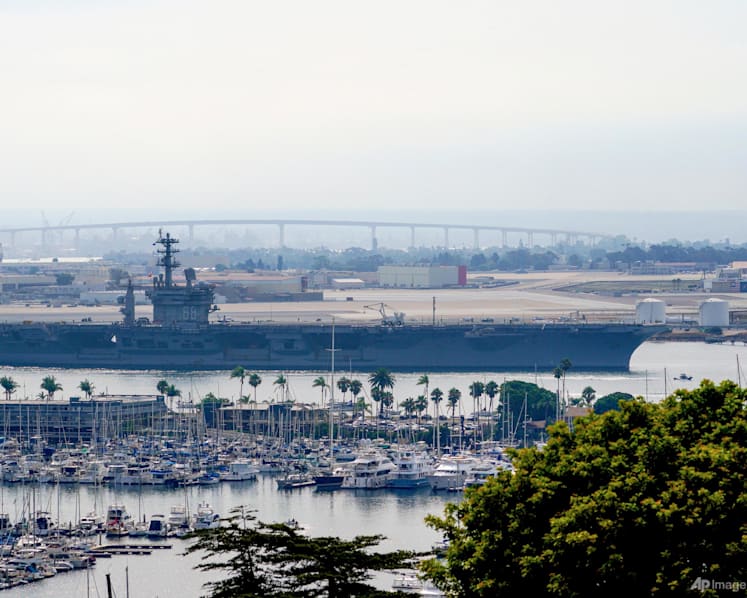 US Navy helicopter, jet crash into South China Sea