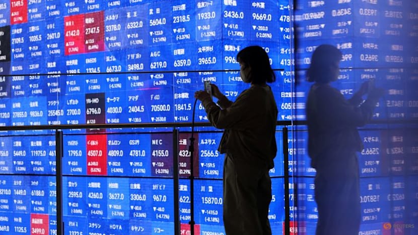 Asian shares track Wall Street higher, Treasury yields near multi-decade highs