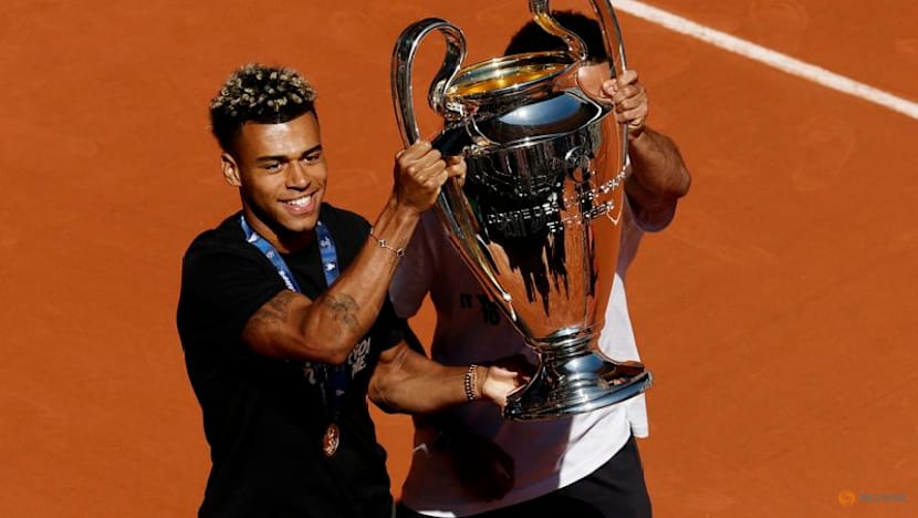 PSG players celebrate Champions League back-to-back titles with French Open crowd