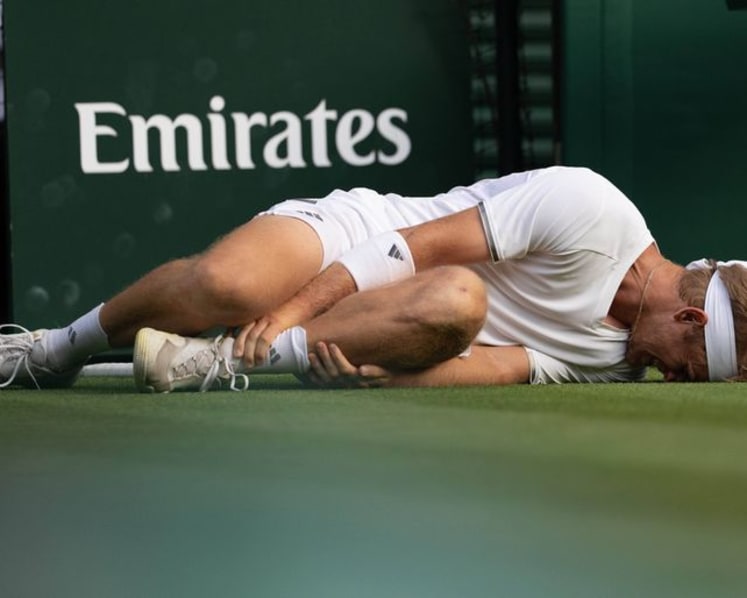 Auger-Aliassime labels injury rule a disgrace after stormy win