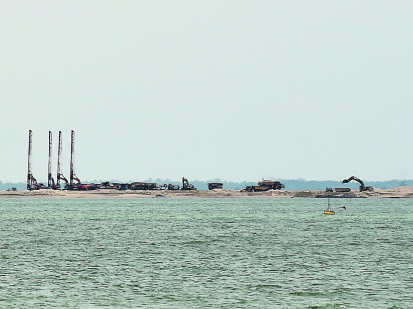 Reclamation work off the Strait of Johor for Malaysia's Forest City project. TODAY file photo