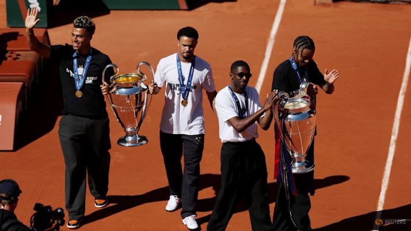 PSG players celebrate Champions League back-to-back titles with French Open crowd