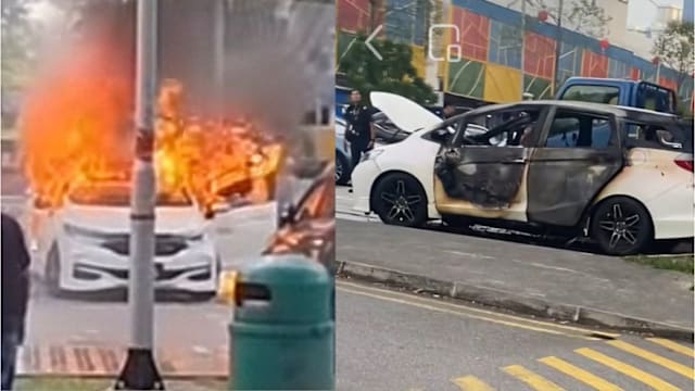 停泊汽车突起火燃烧 热心公众拉水喉灭火