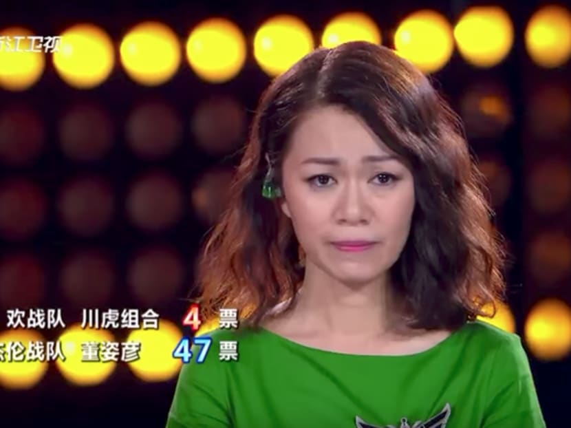 Joanna Dong getting emotional after the announcement of her advancement into the next round during the ninth episode of Sing! China telecasted on Sept 8, 2017. Screencap: ZJSTV Music Channel/YouTube Joanna Dong getting emotional after the announcement of her advancement into the next round during the ninth episode of Sing! China telecasted on Sept 8, 2017. Screencap: ZJSTV Music Channel/YouTube