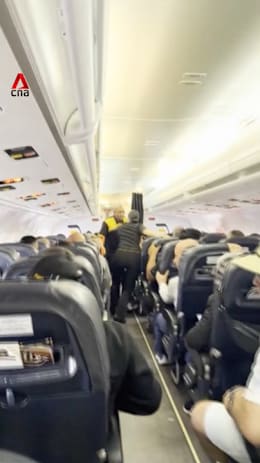 Passengers panic as twin quakes rattle plane at Venezuelan airport