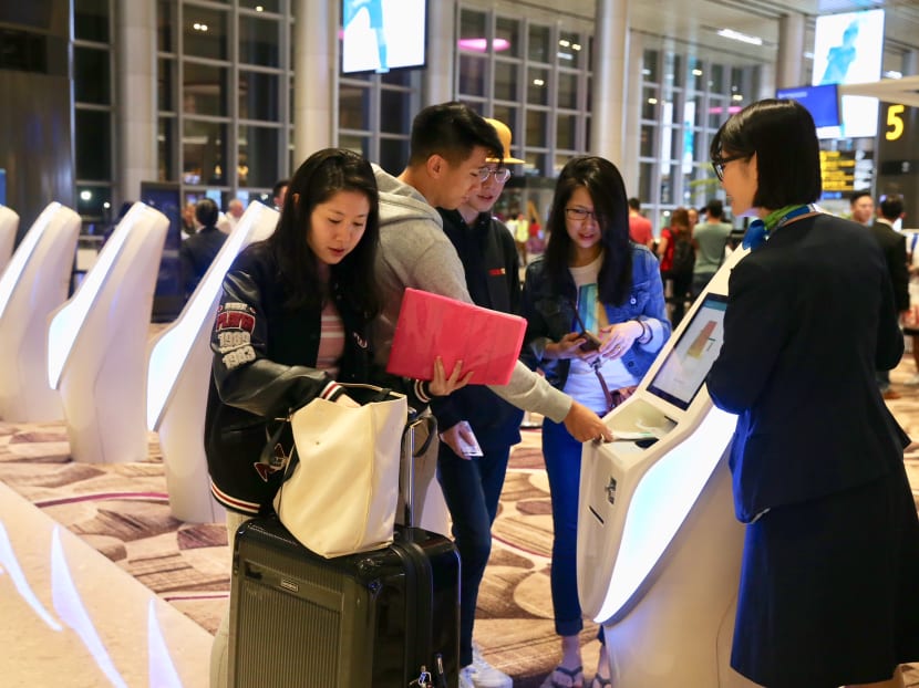 Travellers at Changi Airport’s fourth and newest terminal. Terminal 4 is expected to receive and see off 20 flights, carrying close to 6,700 passengers, during its first 24 hours of operations, according to Changi Airport Group. Photo: Koh Mui Fong/TODAY