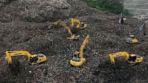 குப்பை நிரப்பும் இடம் சரிந்தது - லாரி ஓட்டுநர்கள் பலி