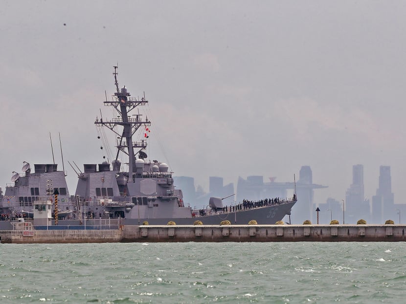 USS John S McCain, which was involved in a collision with a tanker near Pedra Branca, being towed towards Changi Naval Base. Photo: Wee Teck Hian USS John S McCain, which was involved in a collision with a tanker near Pedra Branca, being towed towards Changi Naval Base. Photo: Wee Teck Hian