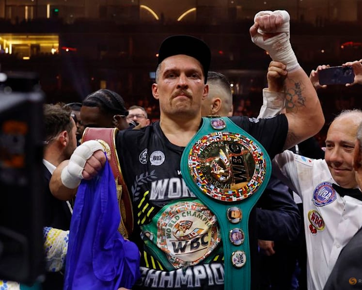 Usyk vacates titles before 'last dance'