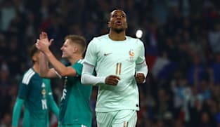 Olise stakes World Cup claim with hat-trick in France win