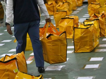 Ballot boxes arriving at a counting centre in Petra Jaya in Kuching, Nov 19, 2022.