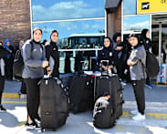 Iranian women's football team arrive back in Iran after some withdrew asylum claim