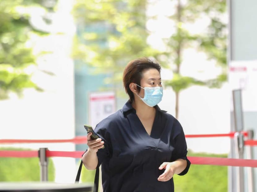 Zhao Lin arrives at the State Courts on April 4, 2022.