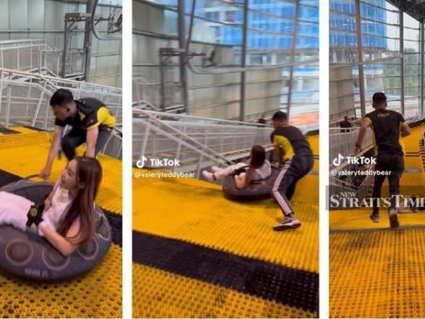 In the video, the girl, who is also a social media influencer is seen sitting on a rubber tube, just before a crew member pushes the rubber tube down a metal slope.
