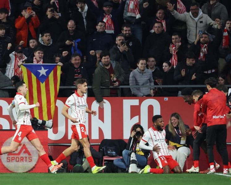 Barcelona stunned by Girona 2-1 to leave Real Madrid top of LaLiga